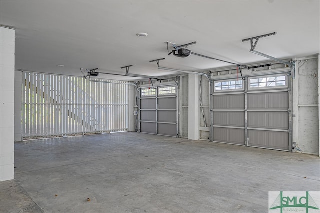 garage featuring a garage door opener