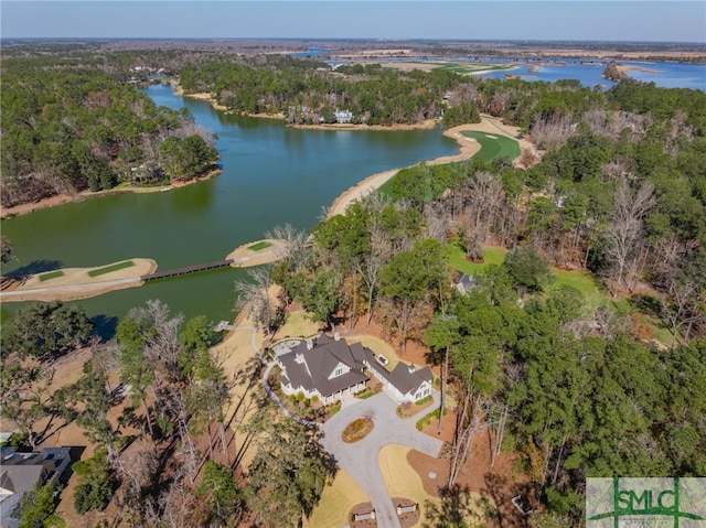 drone / aerial view with a water view