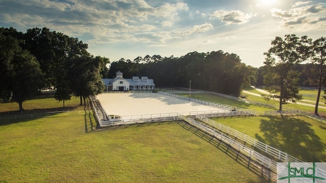 exterior space with a lawn and a rural view