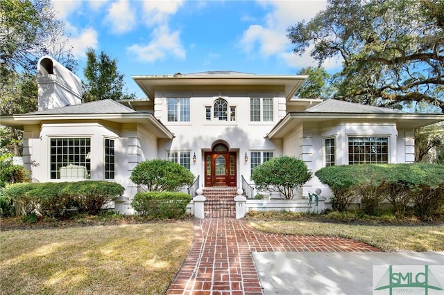 view of front of house with a front yard