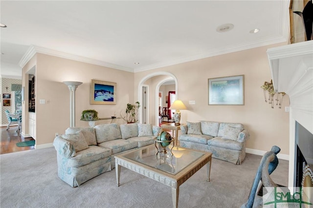 carpeted living room featuring crown molding