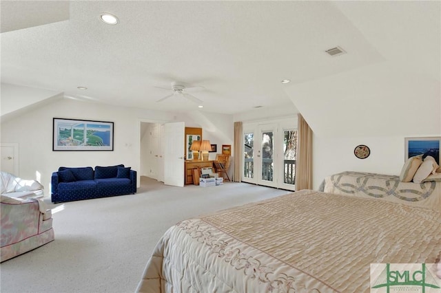 bedroom with vaulted ceiling, access to exterior, ceiling fan, light carpet, and a textured ceiling