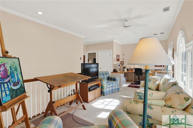 living room with light carpet, crown molding, and ceiling fan