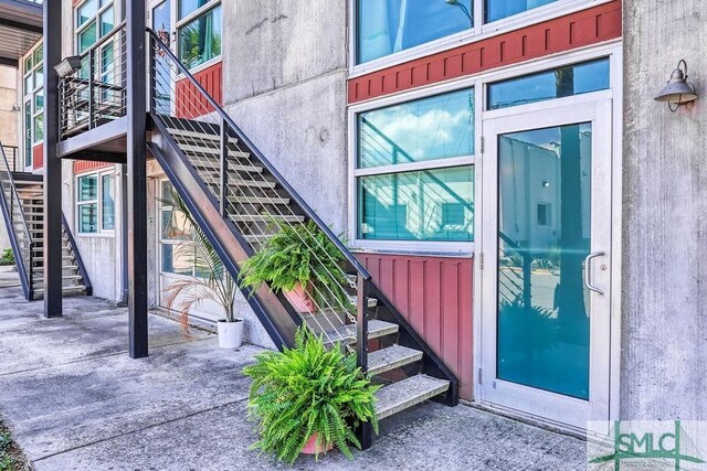 555 Berrien St Unit B, Savannah, GA 31401 - property entrance with board and batten siding
