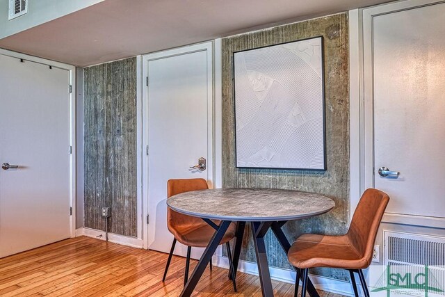 555 Berrien St Unit B, Savannah, GA 31401 - dining room with visible vents and wood finished floors