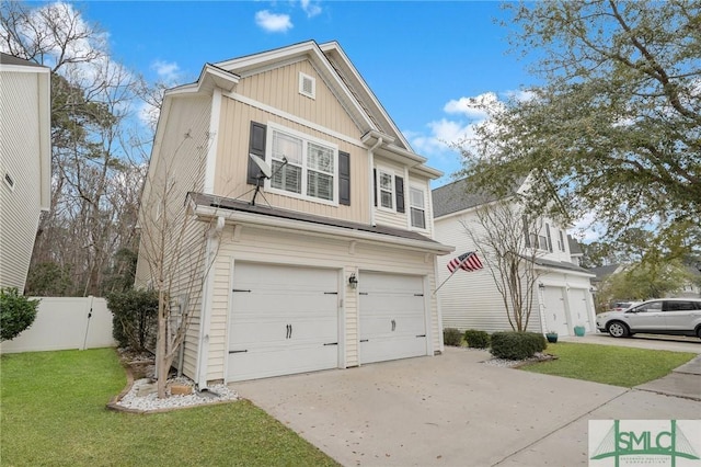 view of front of home with a garage and a front lawn