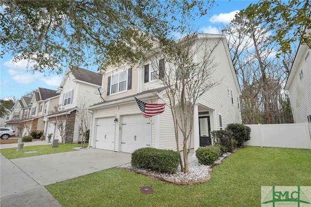 view of front of home with a garage and a front lawn