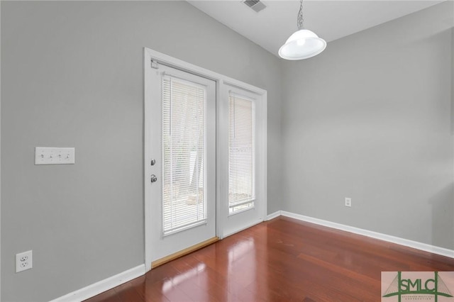 doorway featuring hardwood / wood-style flooring