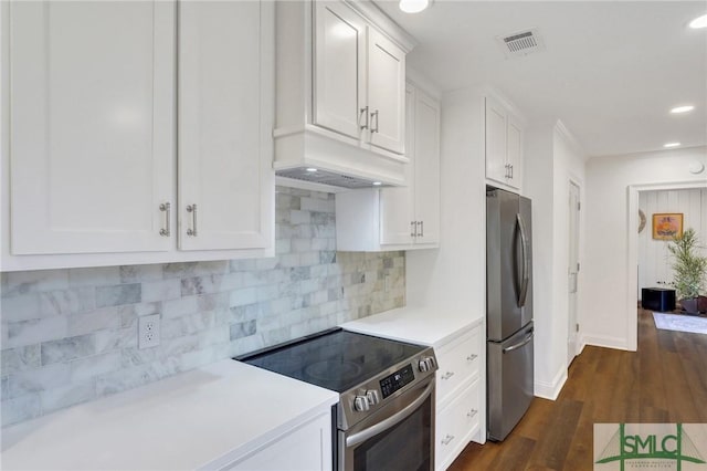 kitchen featuring white cabinetry, tasteful backsplash, dark hardwood / wood-style floors, custom range hood, and stainless steel appliances