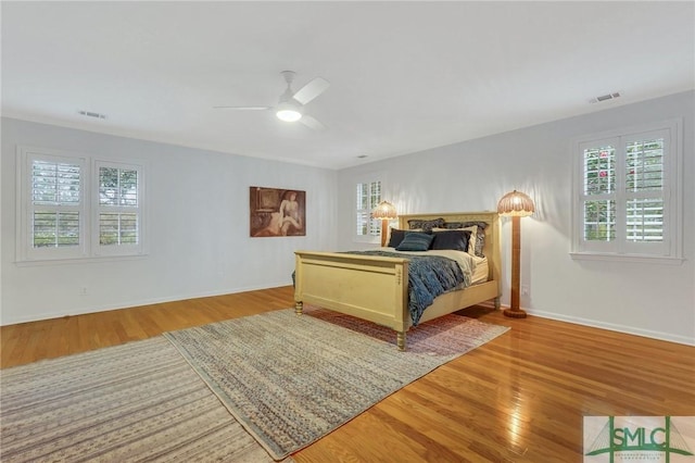 bedroom featuring ceiling fan and light hardwood / wood-style floors