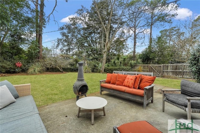 view of yard with outdoor lounge area and a patio