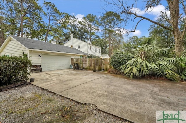 view of side of property featuring a garage