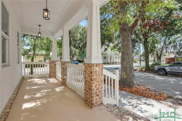 view of patio featuring a porch