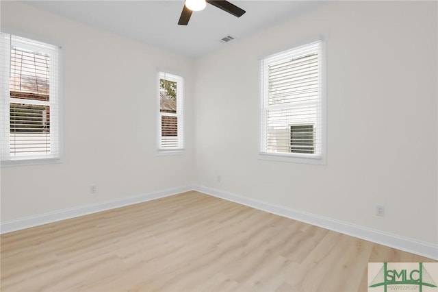 unfurnished room featuring ceiling fan and light wood-type flooring