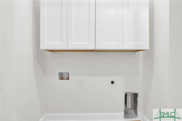 clothes washing area featuring cabinets, washer hookup, and electric dryer hookup