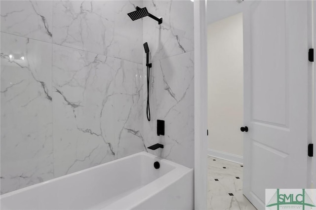 bathroom featuring tiled shower / bath combo