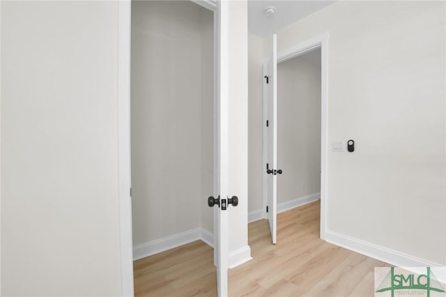 hallway featuring light hardwood / wood-style floors