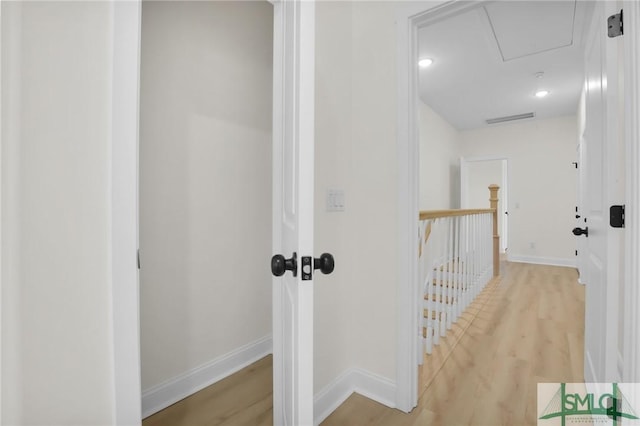 hallway featuring light hardwood / wood-style floors