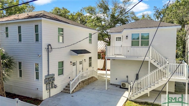 back of house with a patio area