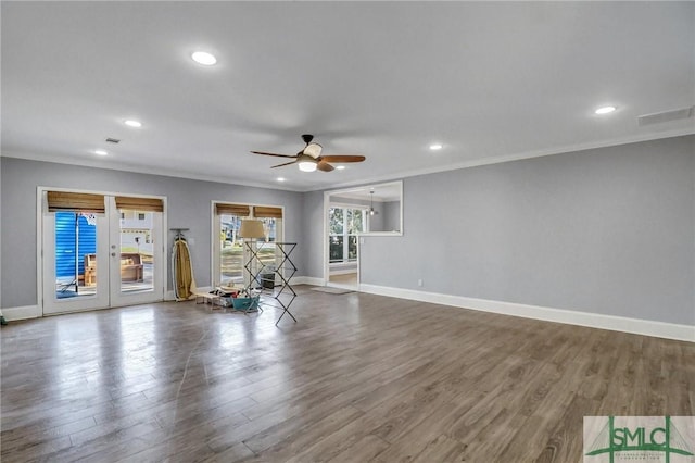 interior space with crown molding, ceiling fan, and hardwood / wood-style floors