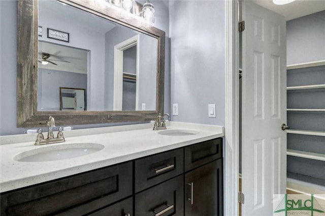 bathroom with vanity and ceiling fan