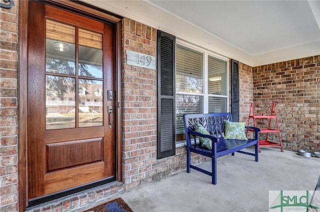 entrance to property with a porch