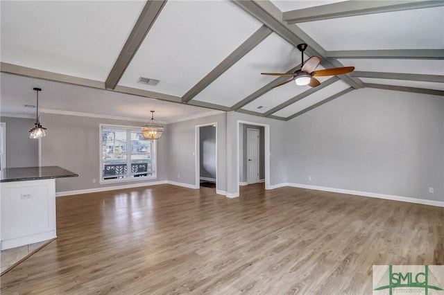 unfurnished living room featuring lofted ceiling with beams, wood-type flooring, crown molding, and ceiling fan with notable chandelier