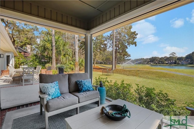 sunroom with a water view