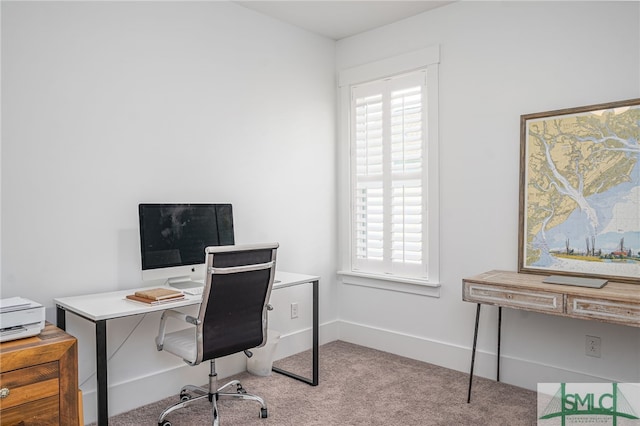 carpeted office space featuring plenty of natural light