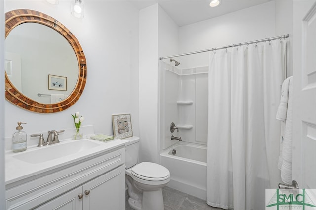 full bathroom featuring vanity, shower / tub combo with curtain, and toilet