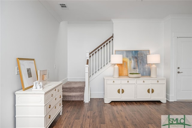 stairs featuring wood-type flooring