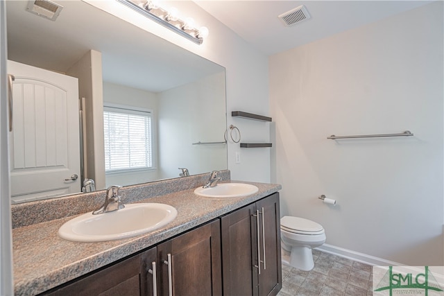 230 Ventura Pl, Pooler, GA 31322 - bathroom featuring vanity and toilet