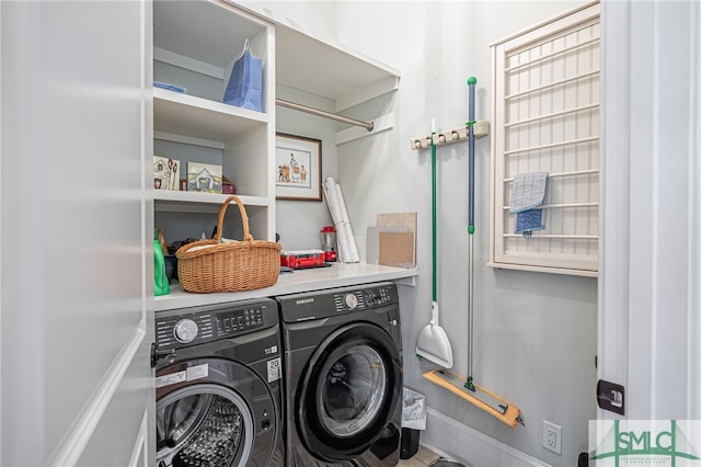 laundry room with separate washer and dryer