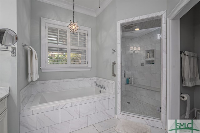 bathroom with crown molding, vanity, and separate shower and tub