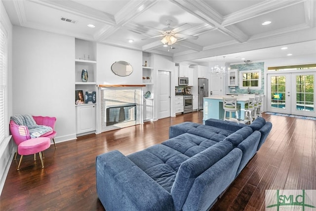 living room featuring beam ceiling, coffered ceiling, dark hardwood / wood-style floors, and french doors