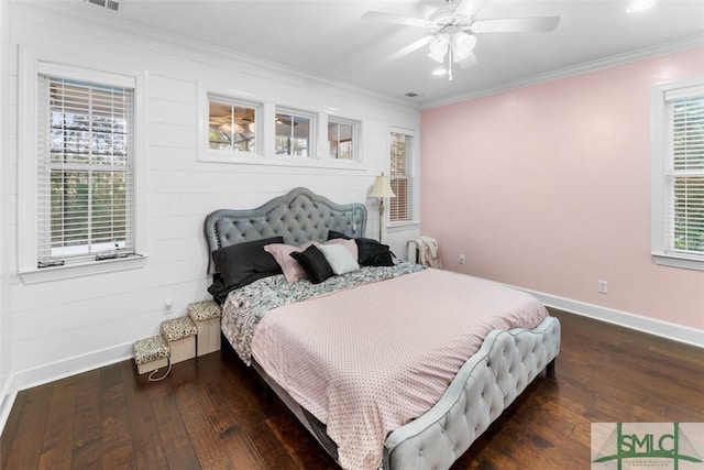 bedroom with multiple windows, crown molding, dark hardwood / wood-style floors, and ceiling fan