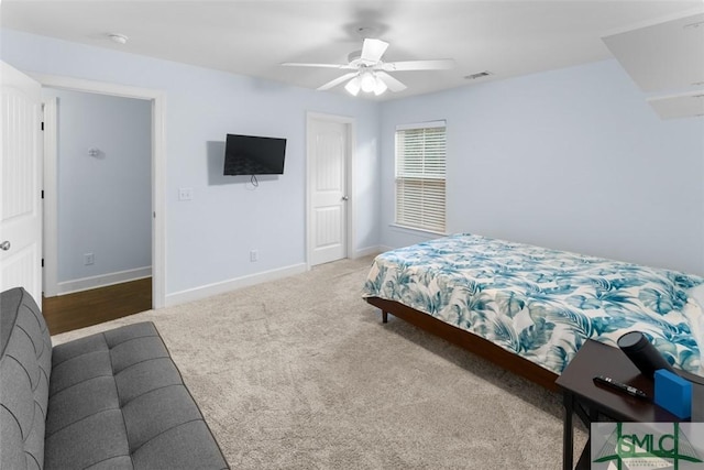 bedroom with ceiling fan and carpet flooring