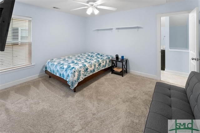 bedroom with ceiling fan and carpet floors