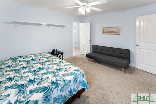 bedroom featuring light carpet and ceiling fan