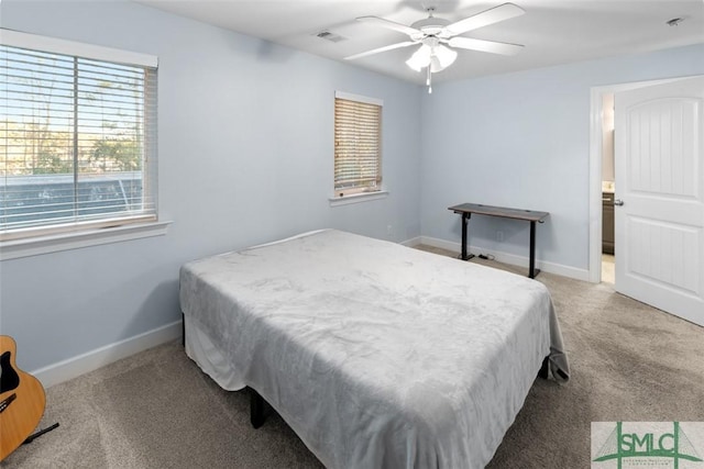 carpeted bedroom featuring ceiling fan