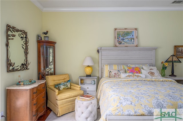 bedroom featuring crown molding