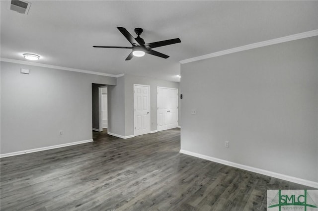 spare room with ceiling fan, ornamental molding, and dark hardwood / wood-style flooring