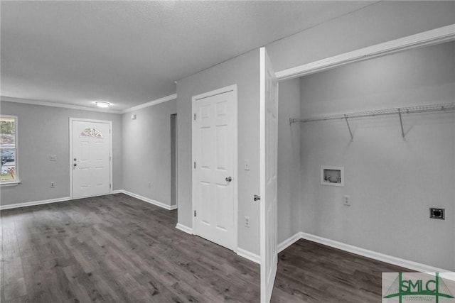 clothes washing area with washer hookup, dark hardwood / wood-style floors, ornamental molding, and hookup for an electric dryer