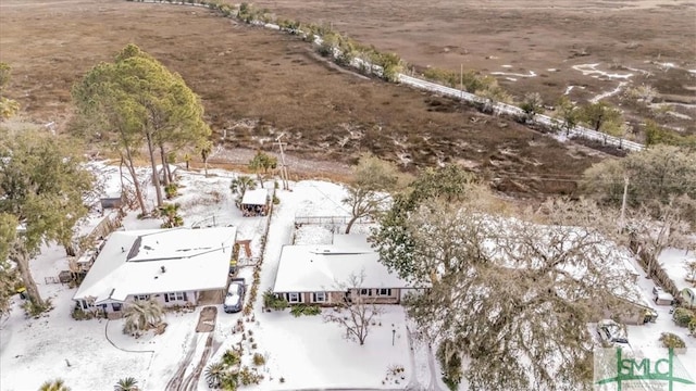 snowy aerial view with a rural view