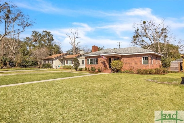 single story home with a front lawn