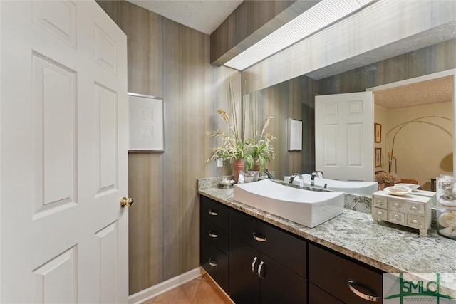 bathroom featuring vanity and tile patterned floors