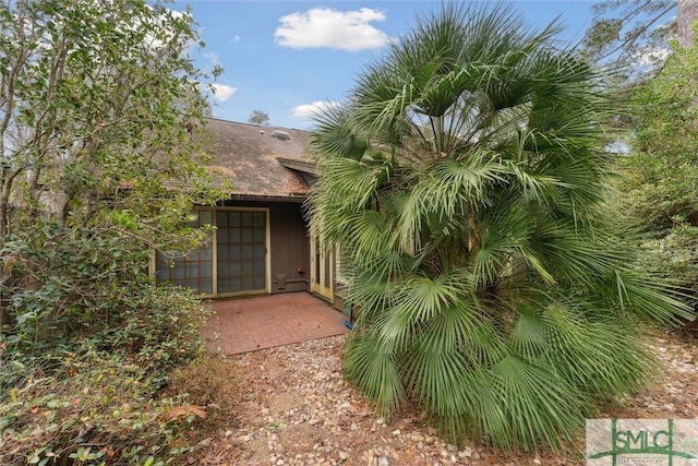 property entrance featuring a patio