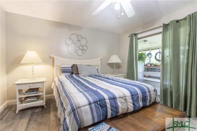 bedroom with hardwood / wood-style flooring and ceiling fan