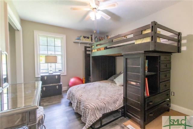 bedroom with wood-type flooring