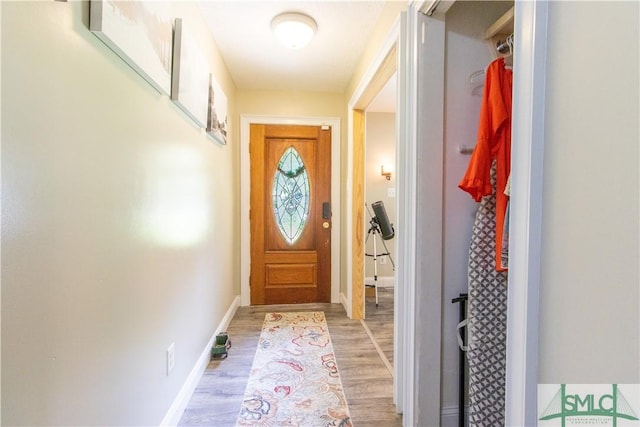 doorway to outside featuring light hardwood / wood-style floors